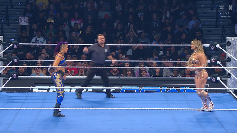 Bayley and Stratton staring each other down in the ring