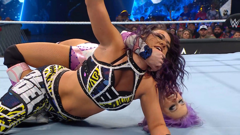 LeRae with a submission locked in on Bayley