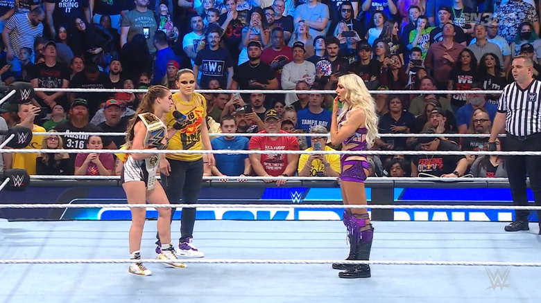 Flair, Rousey and Baszler in the ring