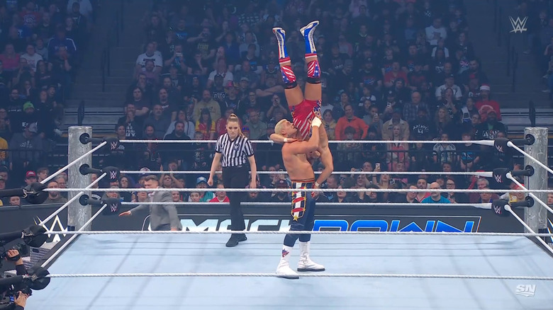 Rhodes with Gable up in a delayed vertical suplex position