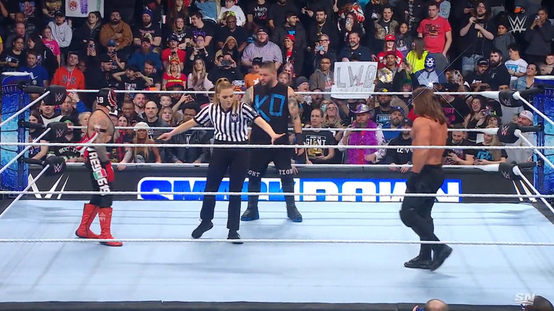 Owens, Styles, and Rey in the ring