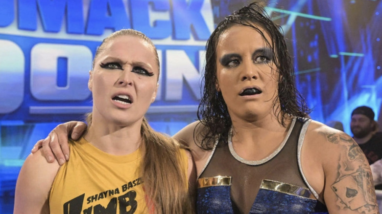 Ronda Rousey and Shayna Baszler yelling