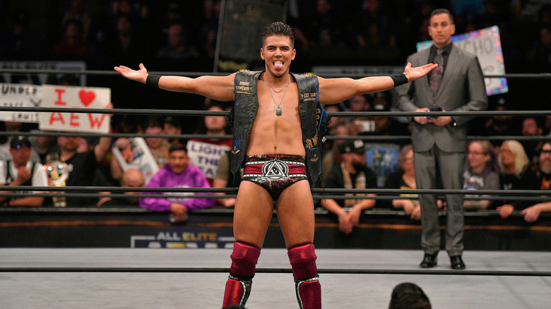 Sammy Guevara poses on the ring apron