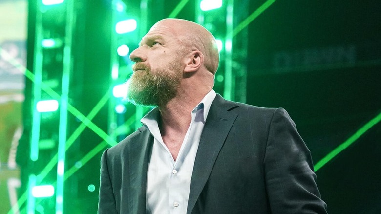 Triple H with green lighting