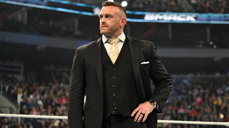 WWE SmackDown GM Nick Aldis with his hand on his hip