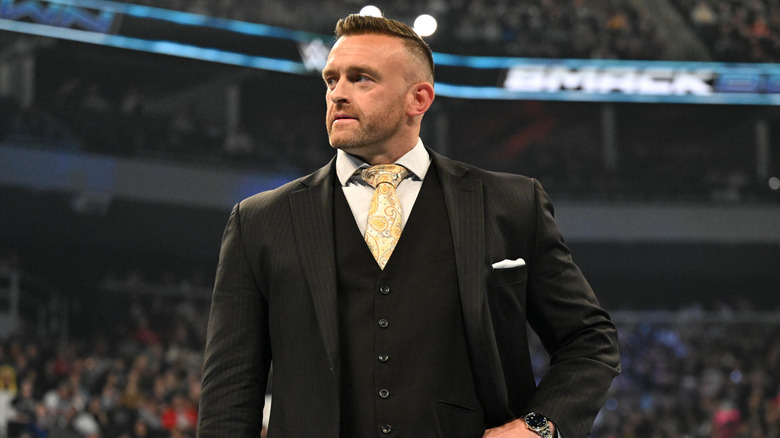 SmackDown General Manager Nick Aldis looks on during WWE SmackDown at Fiserv Forum on November 15, 2024 in Milwaukee, Wisconsin.