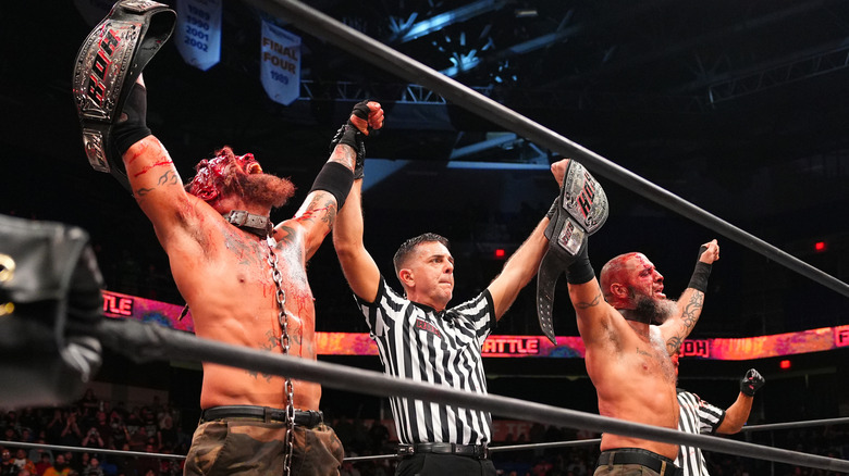 The Briscoes with the ROH World Tag Team Titles