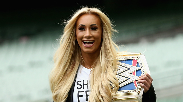 Carmella smiling