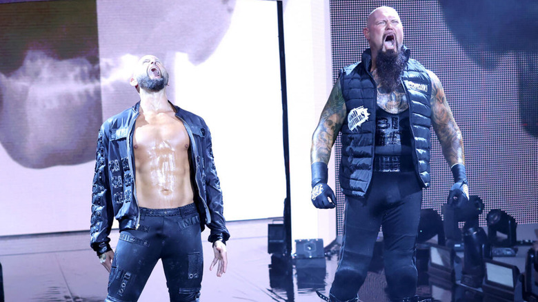 Karl Anderson and Luke Gallows walking to the ring