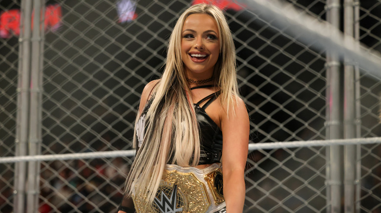 Liv Morgan smiles on before a title defense