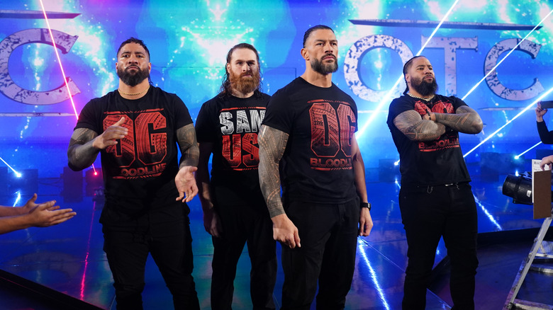 Jey Uso, Sami Zayn, Roman Reigns, and Jimmy Uso on WWE SmackDown entrance ramp