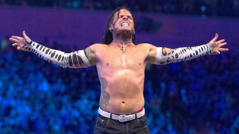 Jeff Hardy poses with his arms outstretched