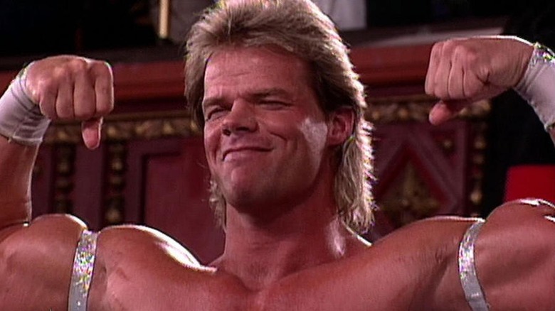 Lex Luger flexing his arms