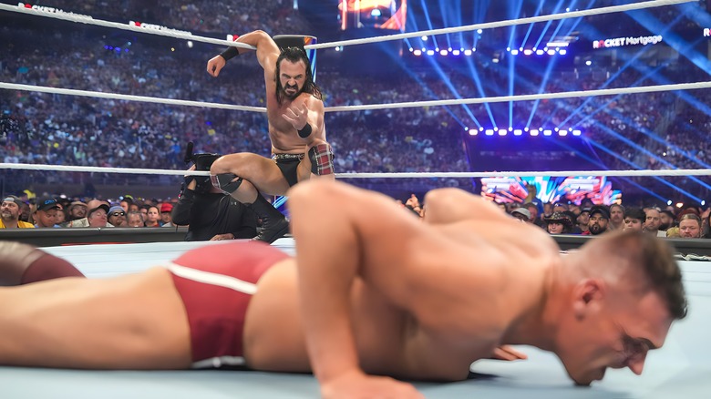 Drew McIntyre measures a prone GUNTHER