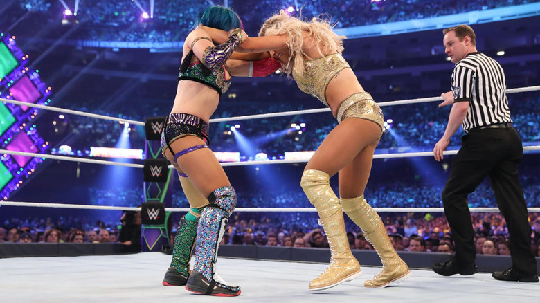 Charlotte Flair and Asuka lock up