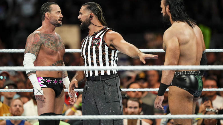 CM Punk, Seth Rollins, and Drew McIntyre