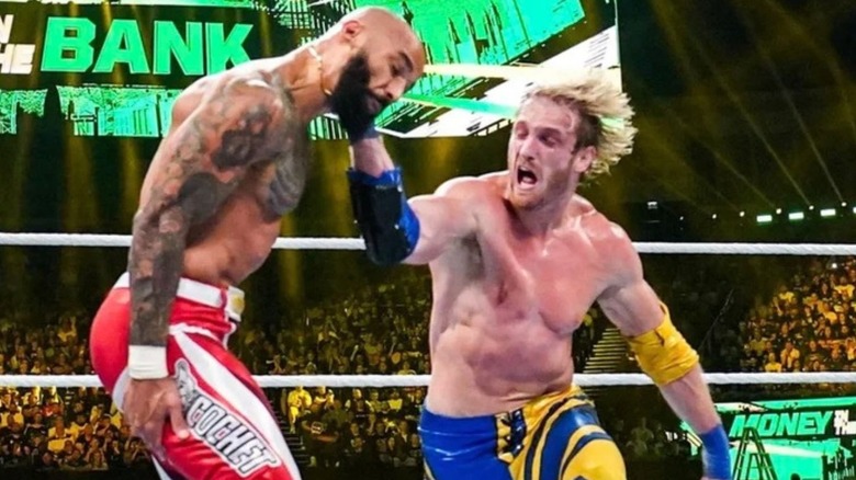 Logan Paul hits Ricochet in the face