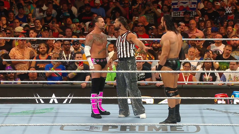 Punk and McIntyre staring each other down