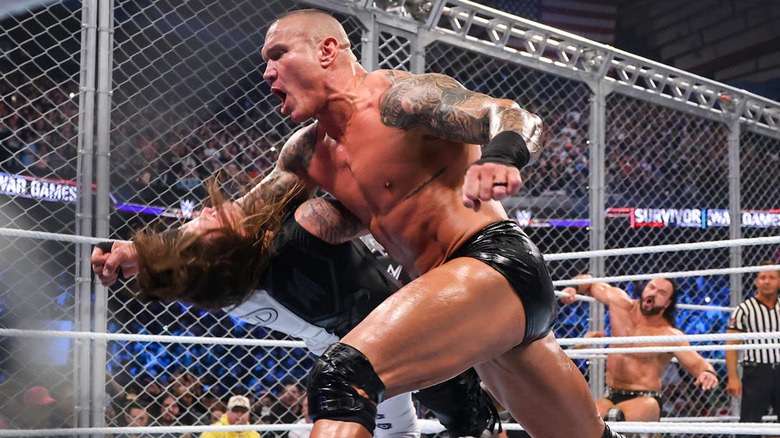 Randy Orton clotheslines an opponent