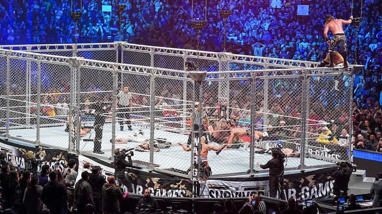 Action continues inside WarGames cage