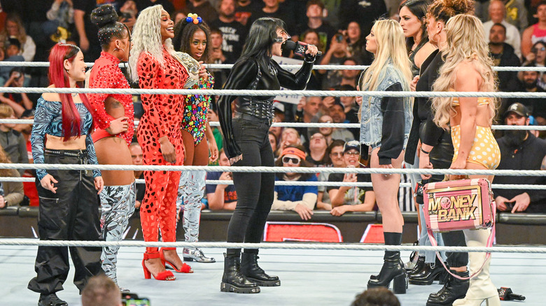 Rhea Ripley shouts "WarGames!" into a microphone on "WWE Raw," her teammates by her side, her enemies before her in the ring.