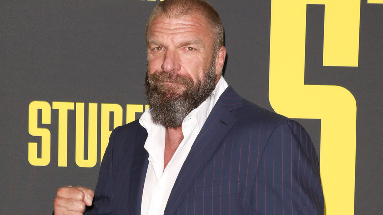 Triple H wearing a suit