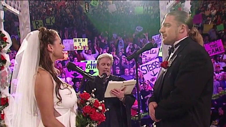 Triple H and Stephanie McMahon at the altar