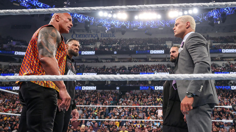 The Rock and Roman Reigns face down Seth Rollins and Cody Rhodes