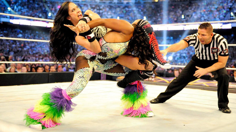 AJ Lee with Naomi in the Black Widow