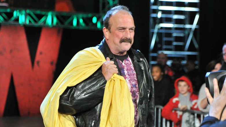 Jake "The Snake" Roberts making his return entrance 