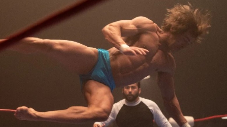 Zac Efron hits a move in the ring, portraying Kevin Von Erich in "The Iron Claw."