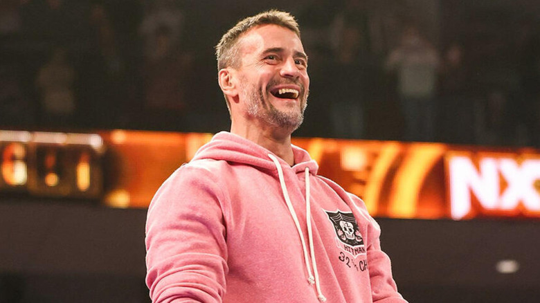 CM Punk smiling in the ring