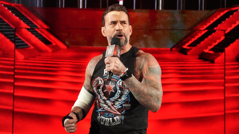 CM Punk, bandaged and wounded, speaks