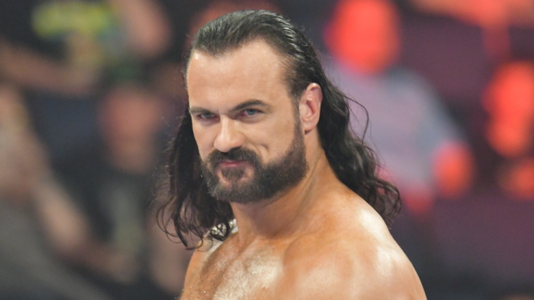 Drew McIntyre smiling in wrestling ring