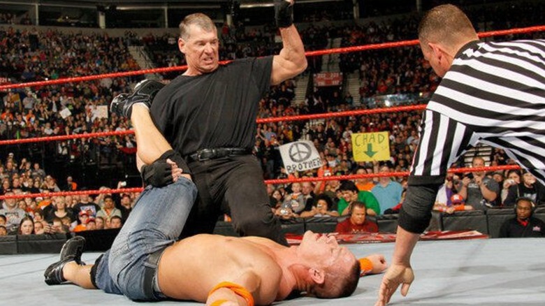 Vince McMahon pinning John Cena