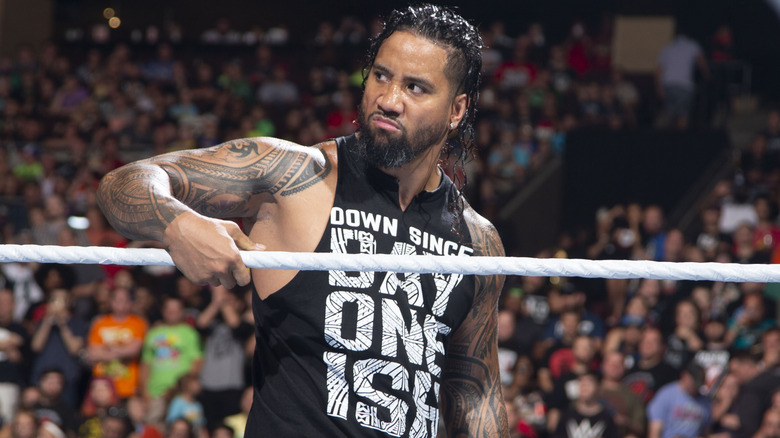 Jey Uso heads into the ring to compete in tag team action