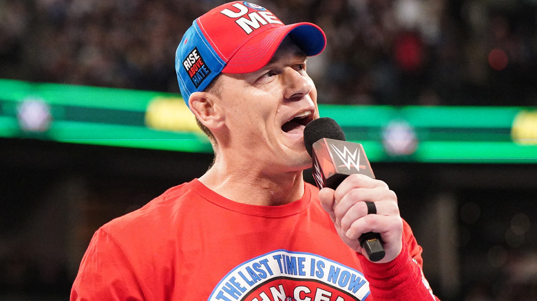 John Cena talking into a microphone