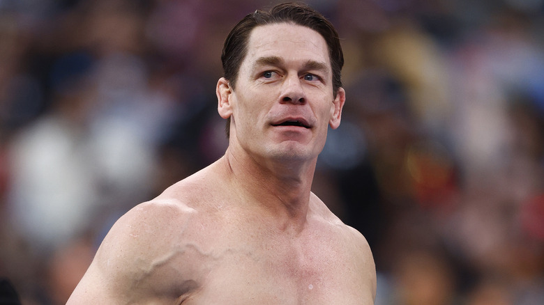 John Cena standing in wrestling ring