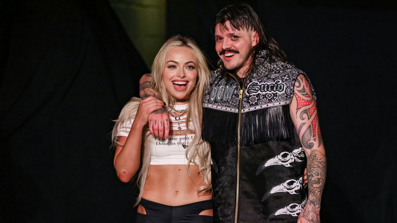 Liv Morgan and Dominik Mysterio smiling