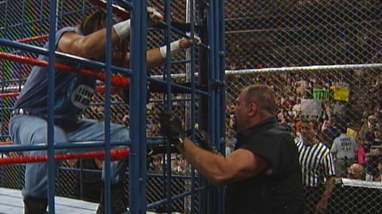 Al Snow and Big Boss Man in a Kennel from Hell match