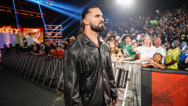 Seth Rollins glowers in a fringe jacket