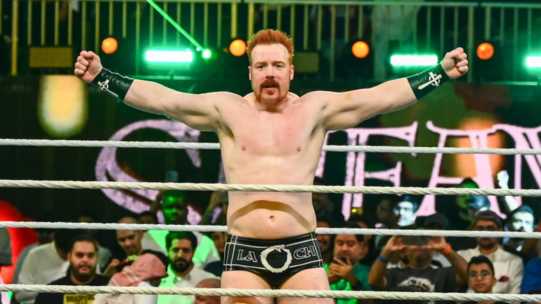 Sheamus with his arms stretched out really far