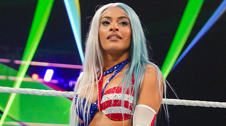 Zelina Vega wearing red, white, and blue ring gear