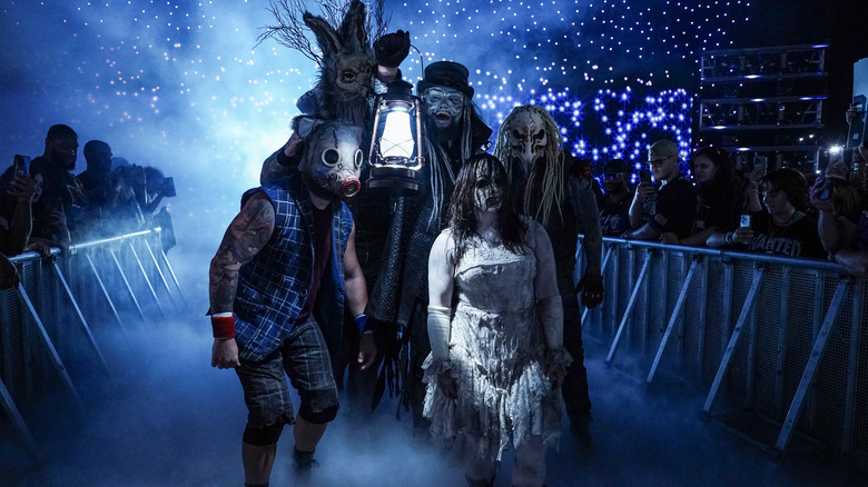 Joe Gacy, Erick Rowan, Bo Dallas, Nikki Cross, and Dexter Lumis of the Wyatt Sicks make their way to the ring during Monday Night RAW at CFG Bank Arena on August 5, 2024 in Baltimore, Maryland.