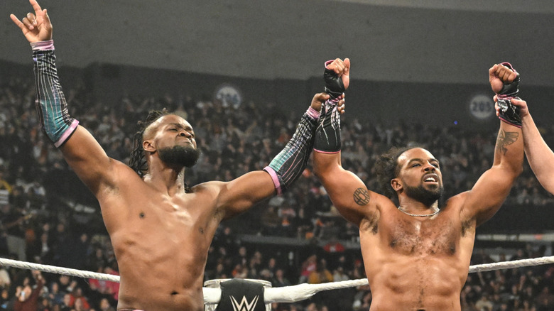 Kofi Kingston and Xavier Woods celebrating their victory on 