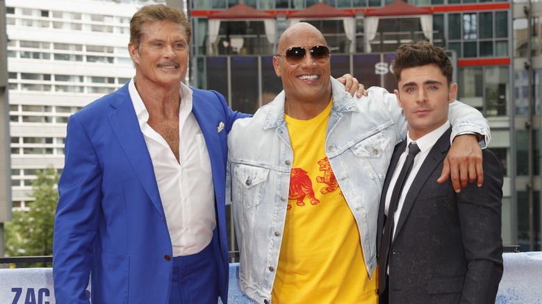 Hasselhoff, Johnson, and Efron posing